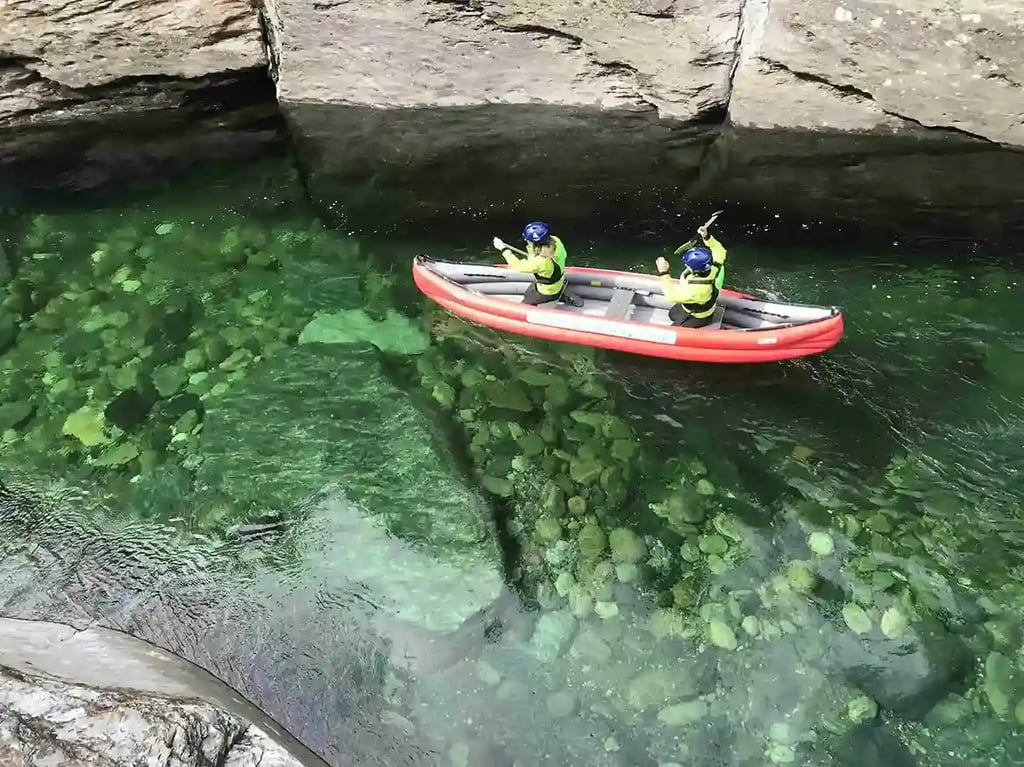 Canoeing over crystal clear water