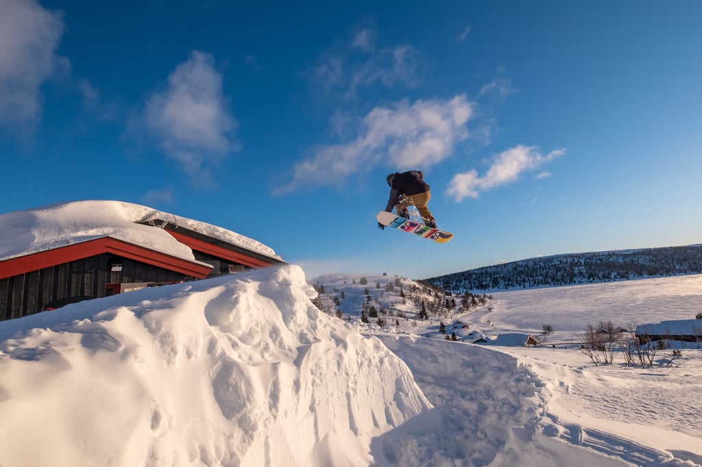 Daniel Sapak performing stunt on Snow mountain