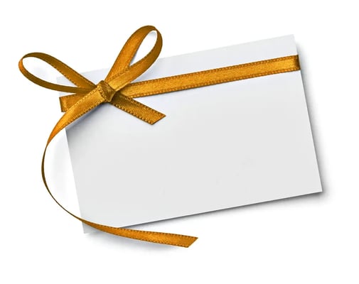 close up of a note card with ribbon bow on white background